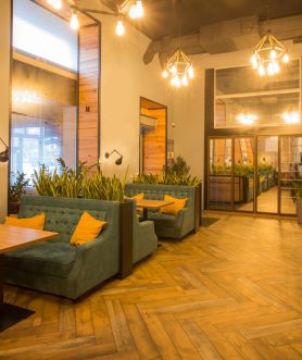 Warm interior of a café powered through the evening by stored solar energy