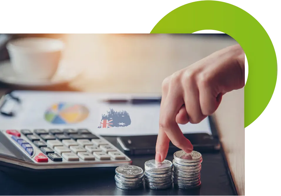 Stacked coins and a calculator representing hot water energy bill savings