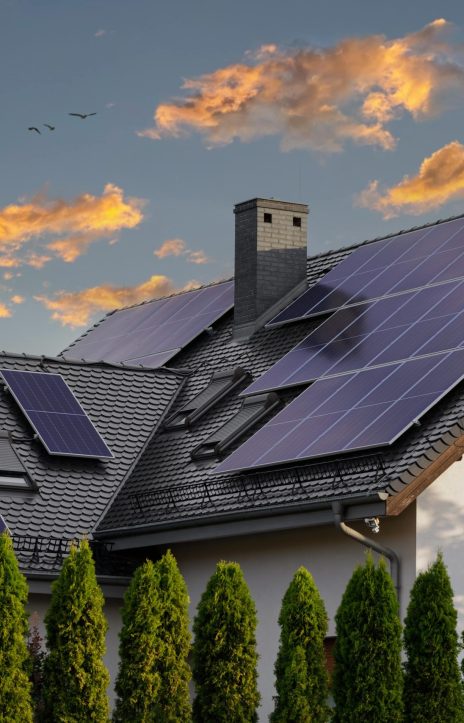 Home with solar panels at sunset ready for battery storage