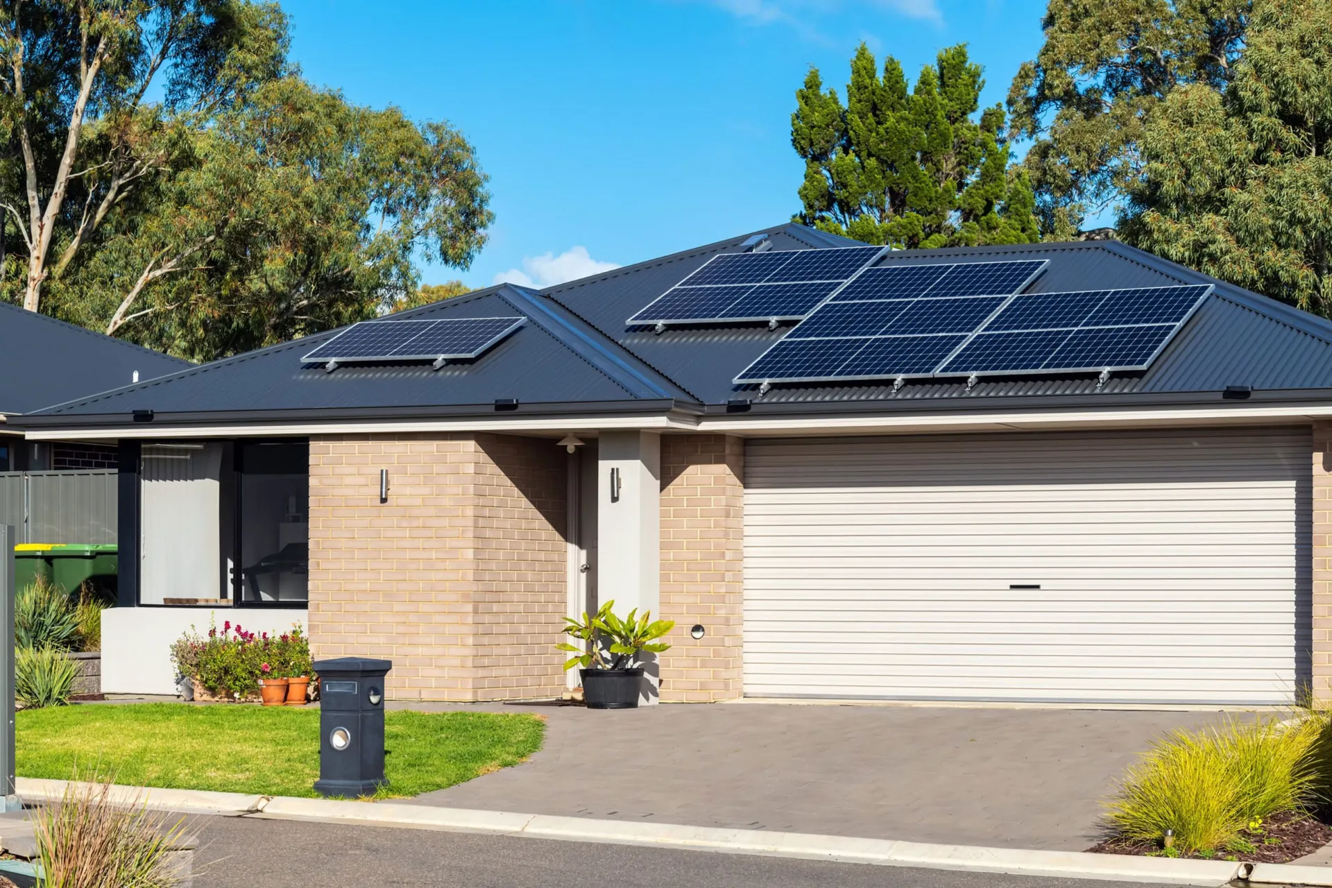 Home with rooftop residential solar panels in Victoria